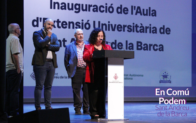 Logotipo del Aula de Extensión Universitaria o retrato de Isabel Marcos.